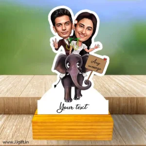 Couple in sit on elephant caricature