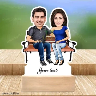 Couple sit on bench caricature 2