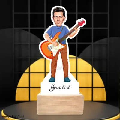 Guitar player statue